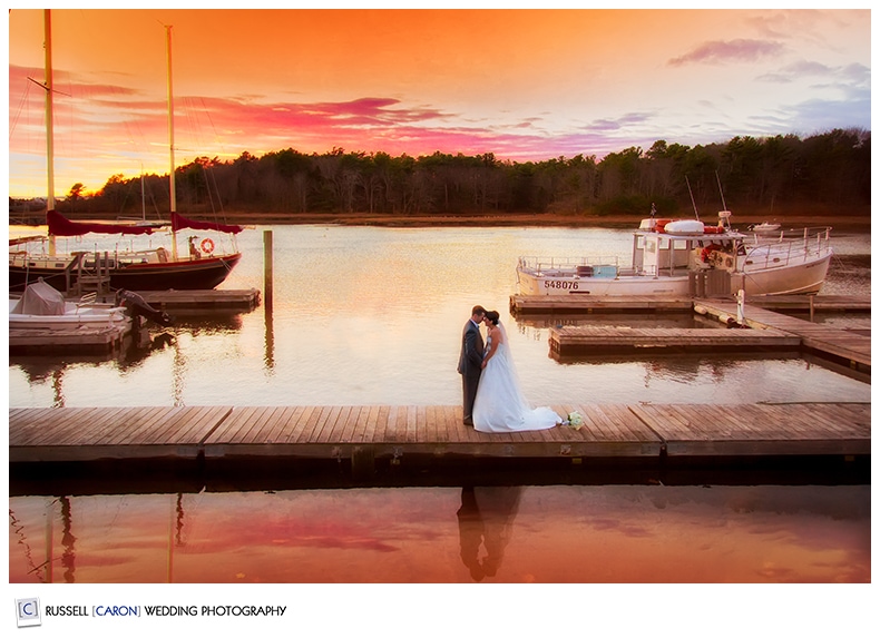 Bride and groom on the dock at the Nonantum Resort