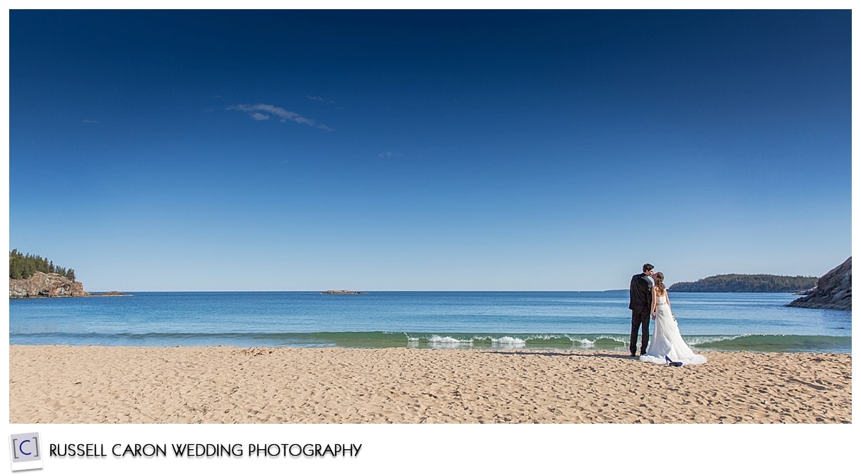 Bride and groom on Sand Beach in Bar Harbor Maine, by Bar Harbor Maine wedding photographers, Russell Caron Wedding Photography