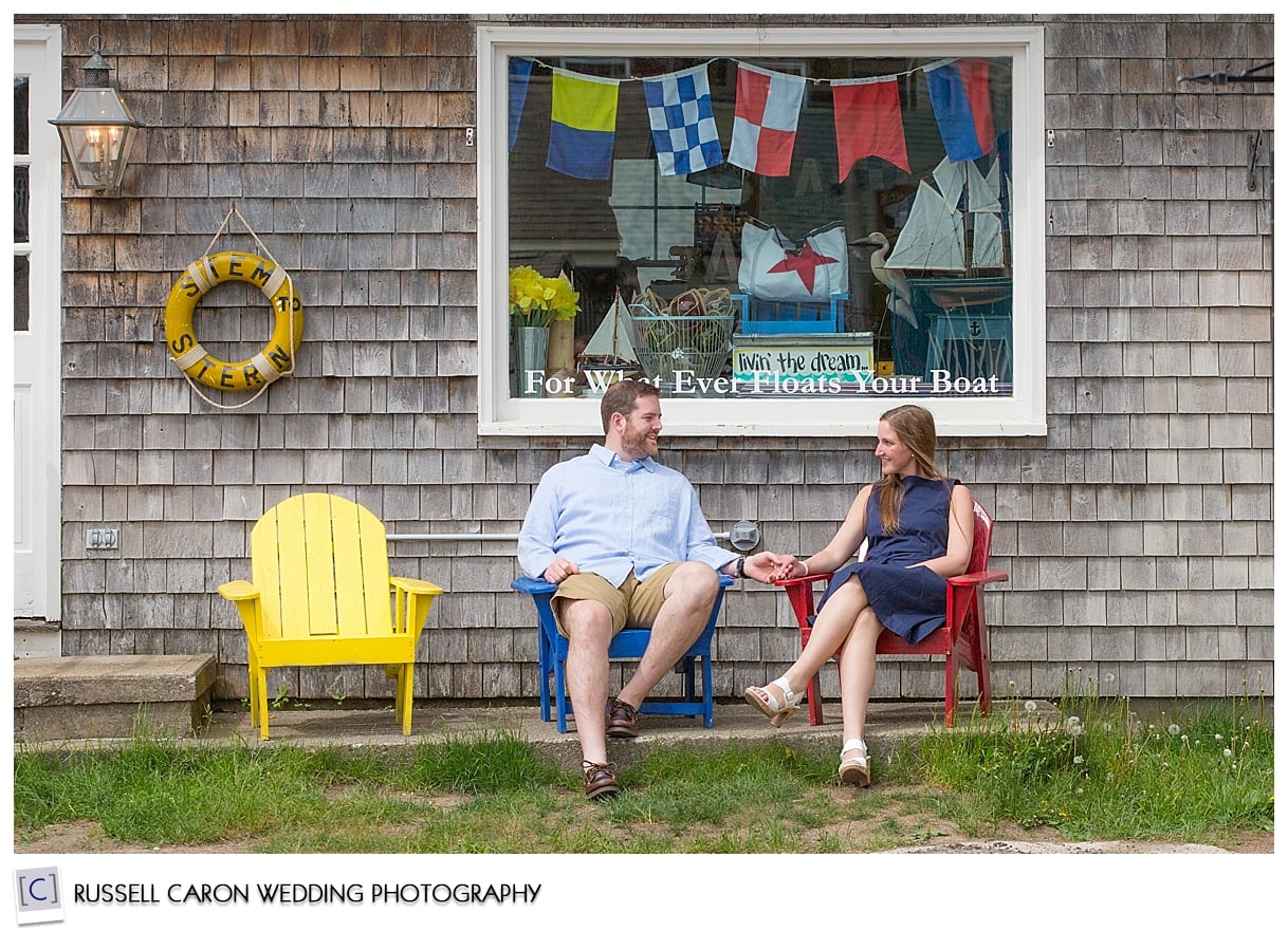 Couple in adirondack chairs, Kennebunkport, Maine