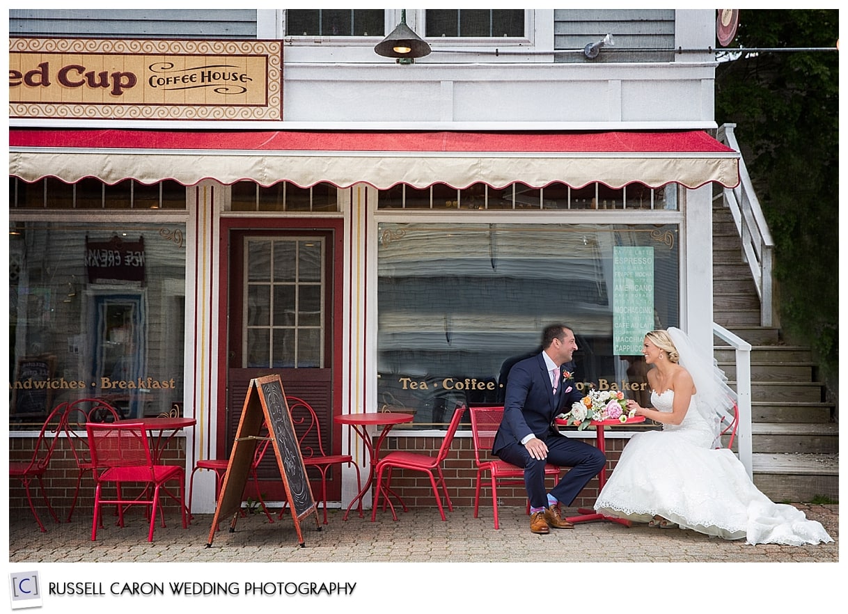 Bride and groom downtown Boothbay Harbor, by Boothbay Harbor Maine wedding photographers, Russell Caron Wedding Photography