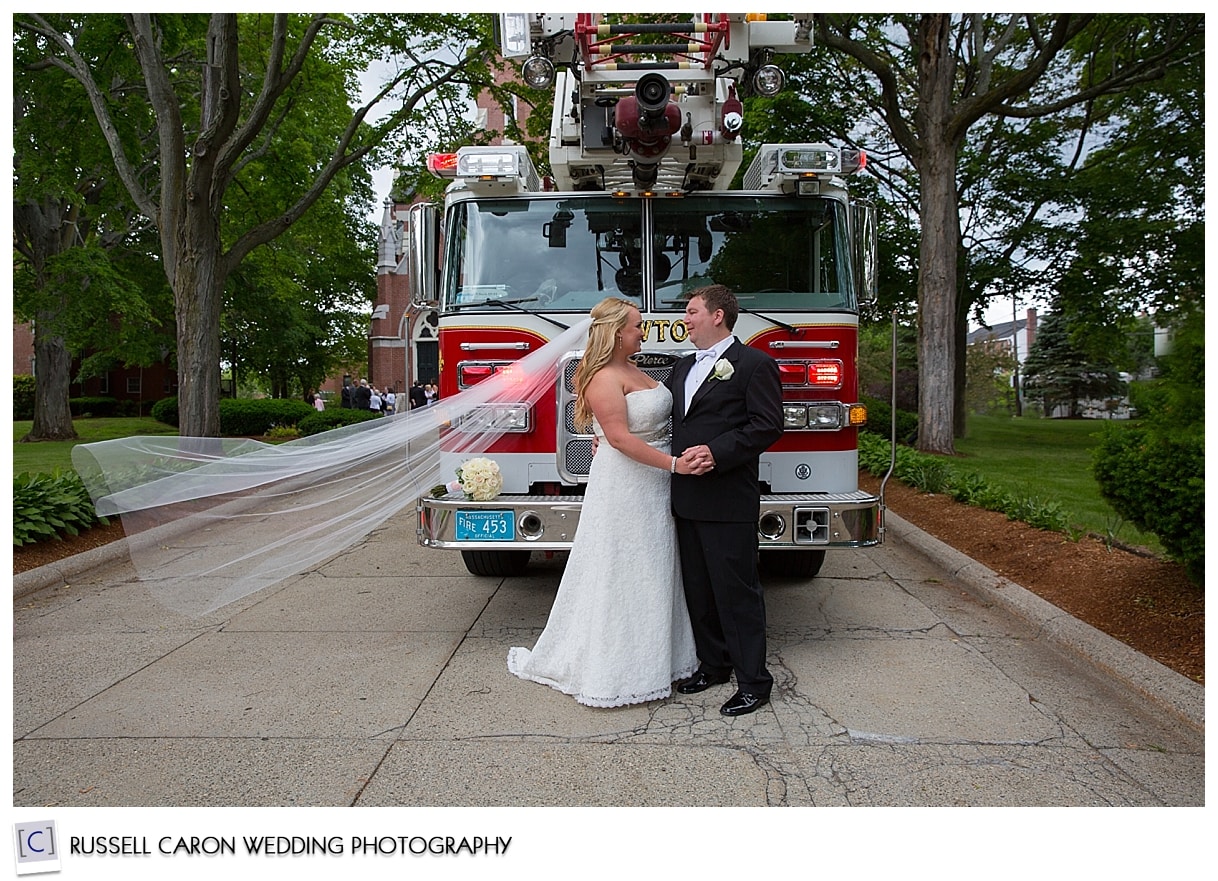 Bride and groom with fire truck