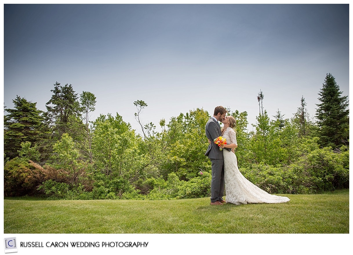 Bride and groom on the lawn