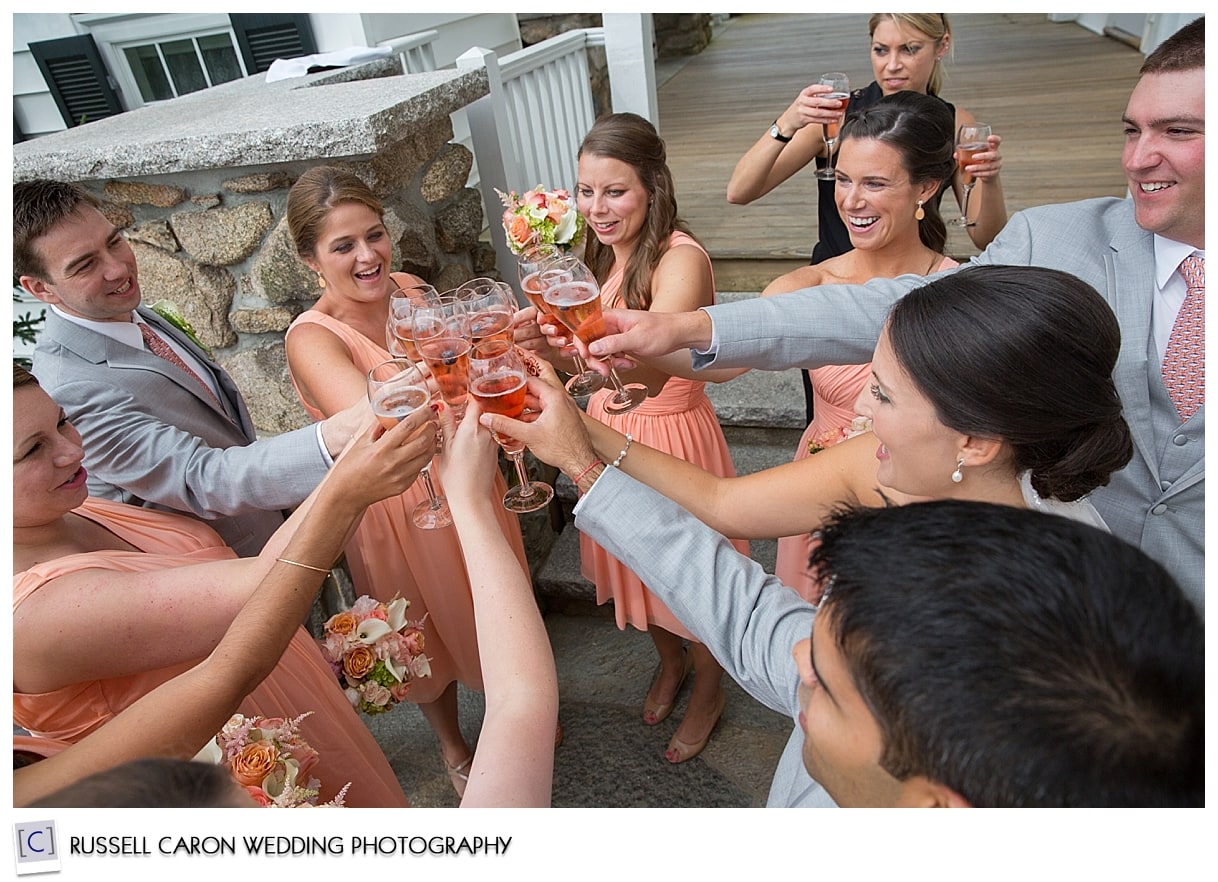 Bridal party toasting with champagne