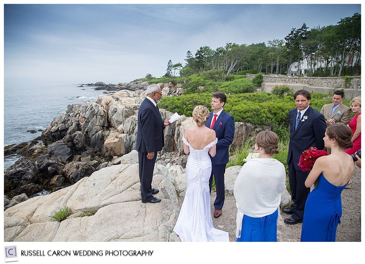 Small wedding ceremony on the rocks in Kennebunkport