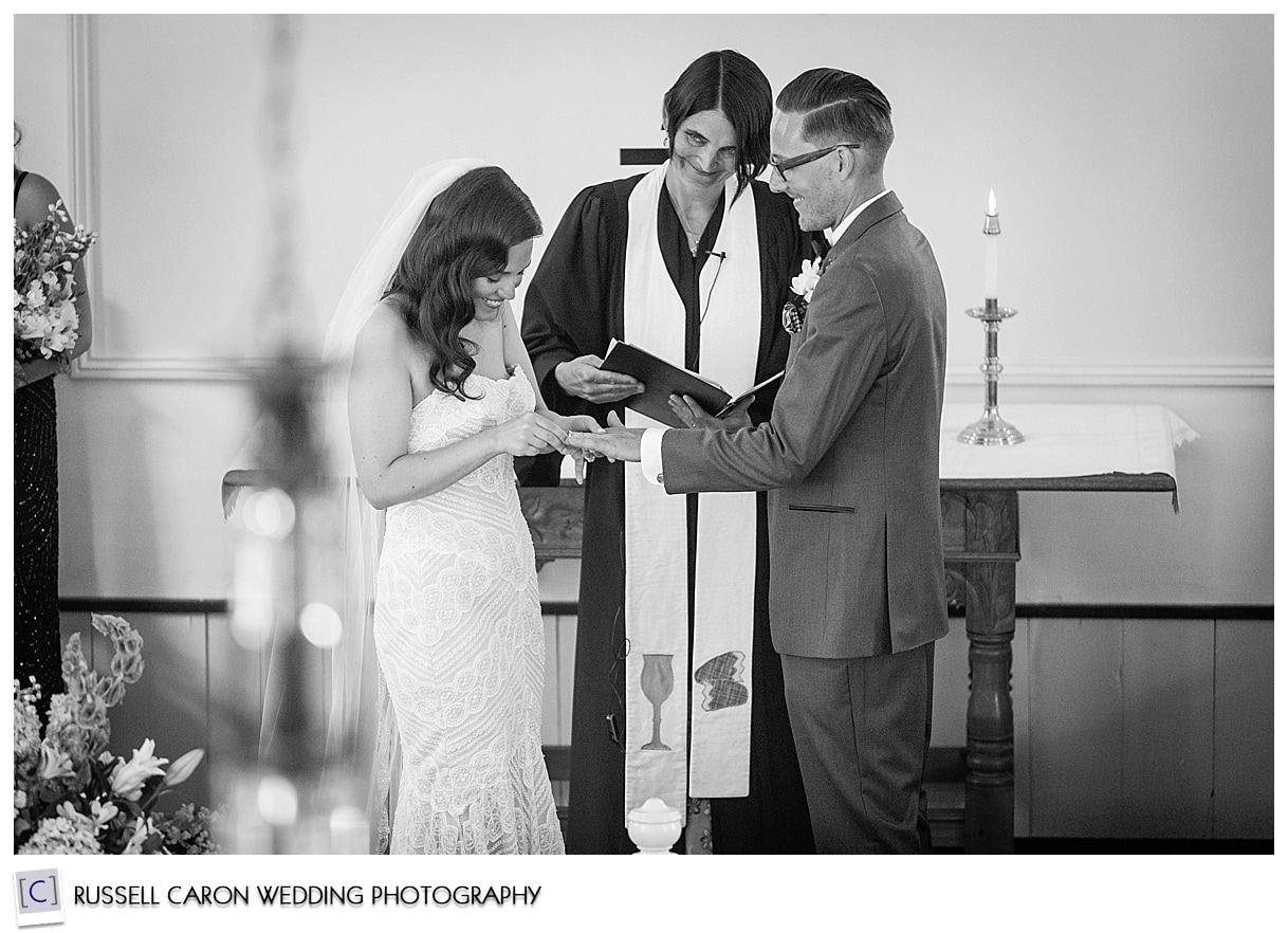 Bride and groom during ring ceremony