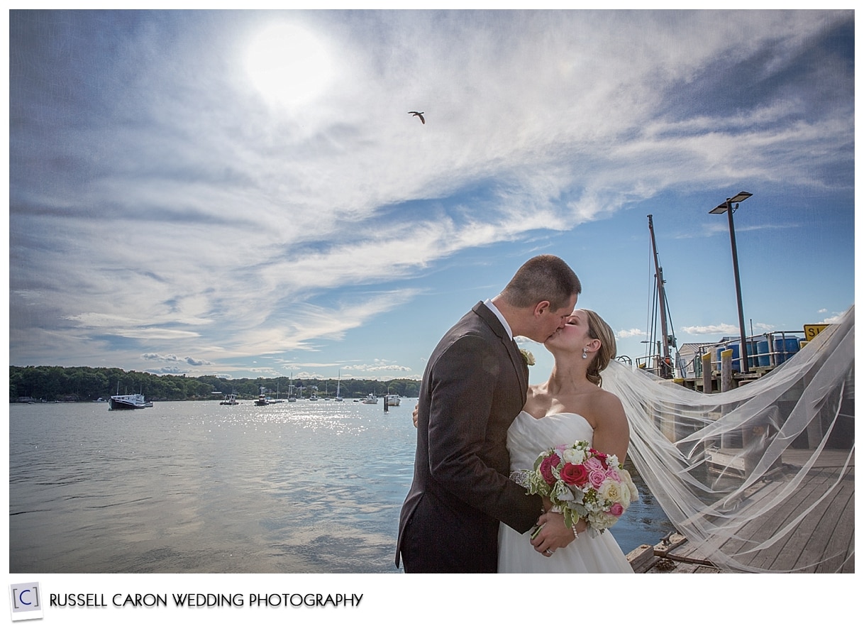 Bride and groom kissing