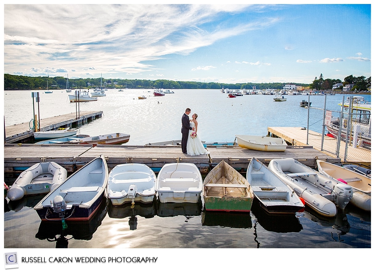 Bride and groom on the dock