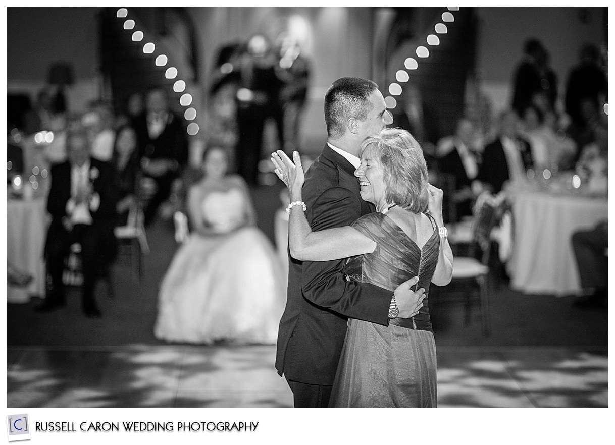 Groom dancing with mother