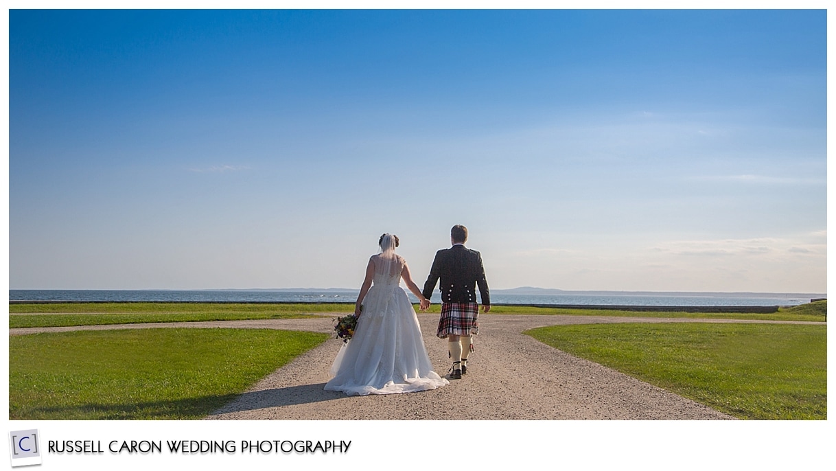 Audrey and Chris walking hand in hand