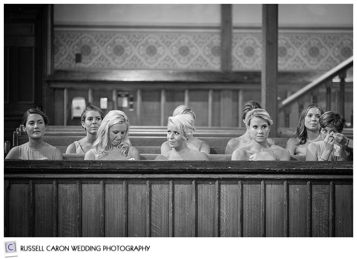 Bridesmaids during wedding ceremony at the First Parish Church Brunswick