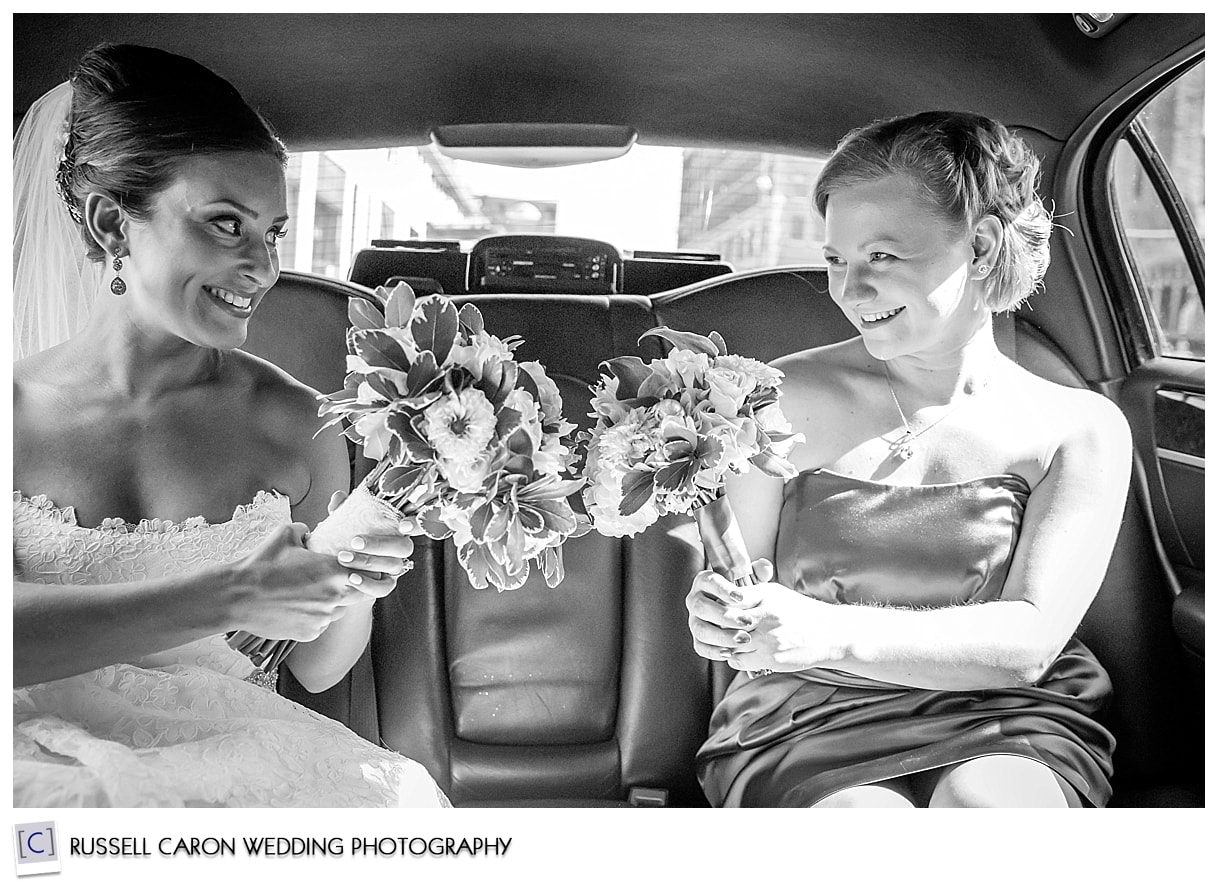 Bride and maid of honor in limo