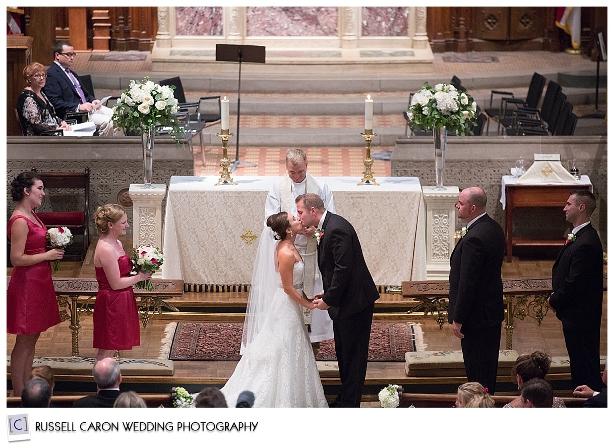 Bride and groom's first kiss