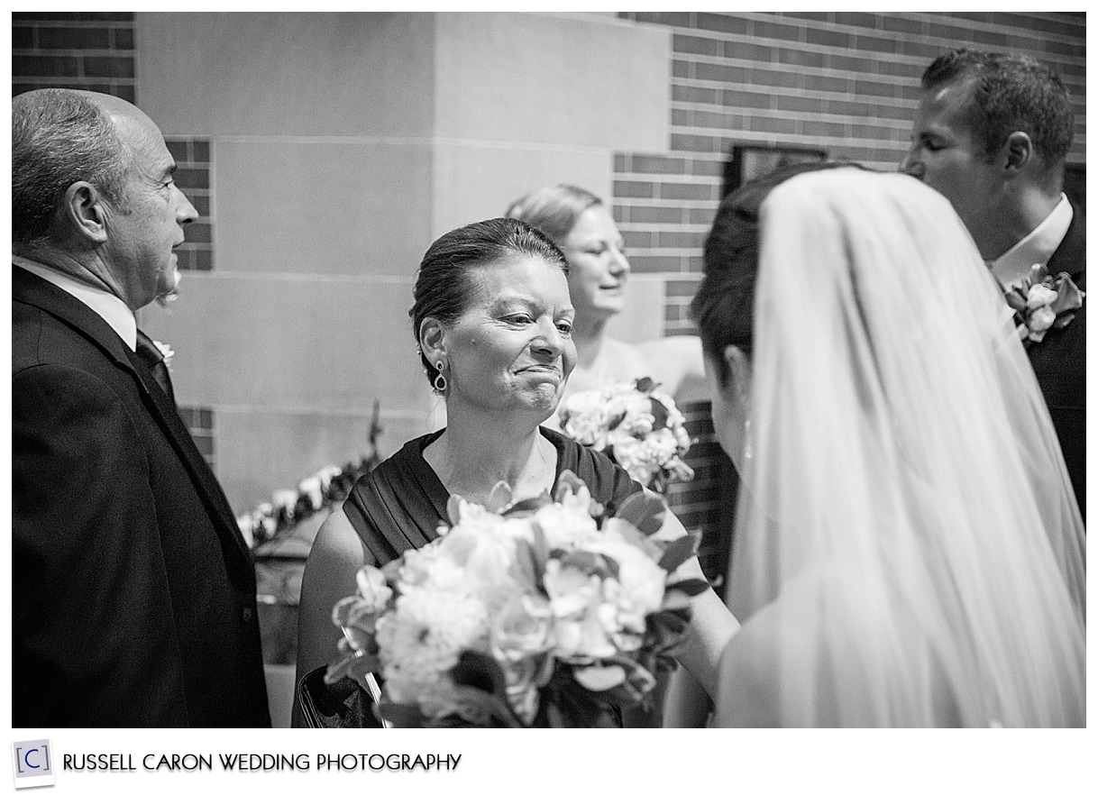 Bride with mother after wedding ceremony