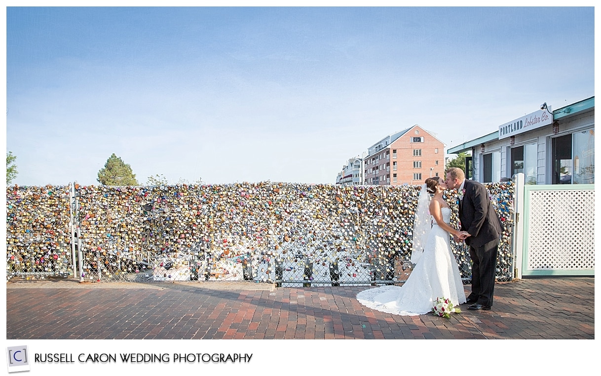 Bride and groom at locks of love Portland Maine