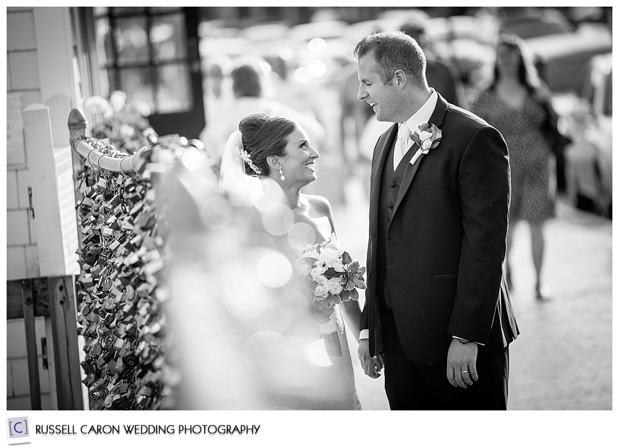 Bride and groom at locks of love Portland Maine