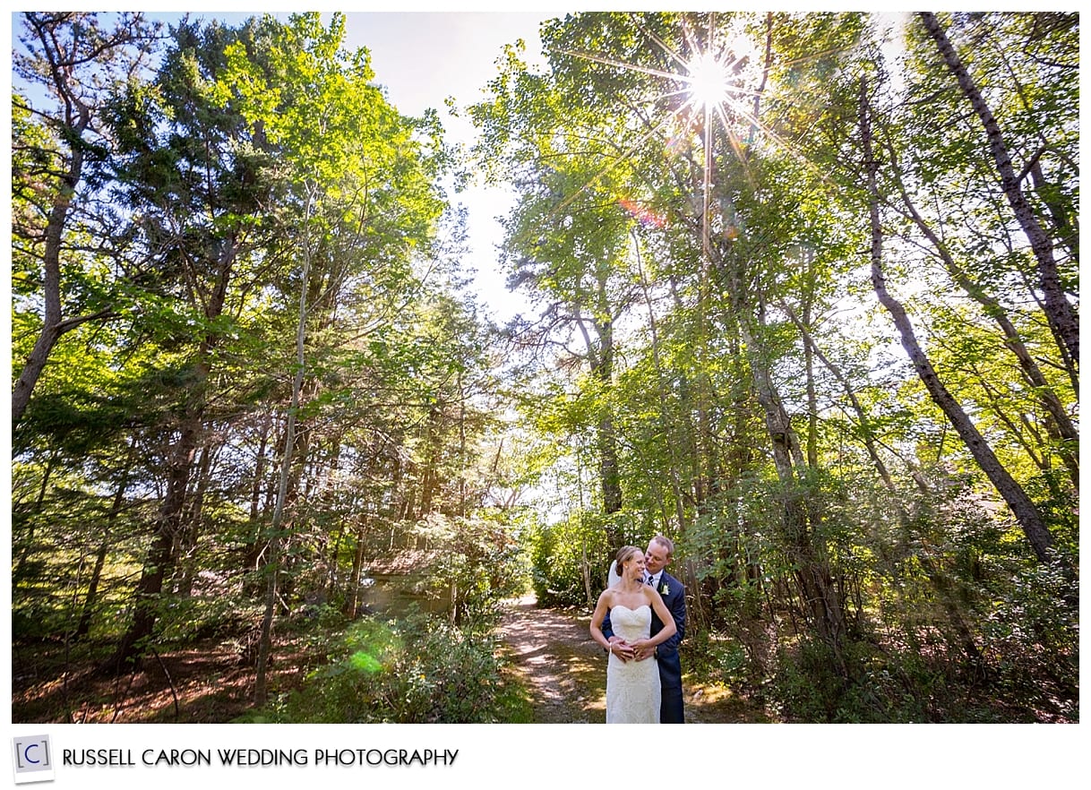 Bride and groom in the woods