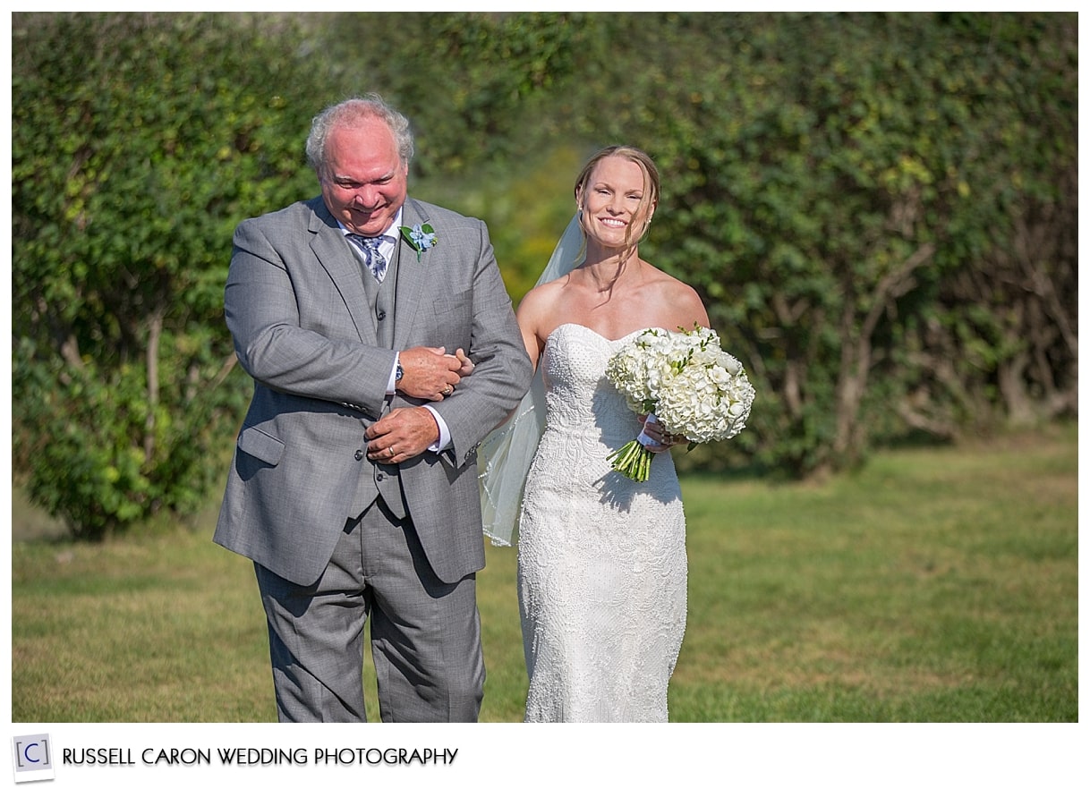 Bride walking down the aisle with her father