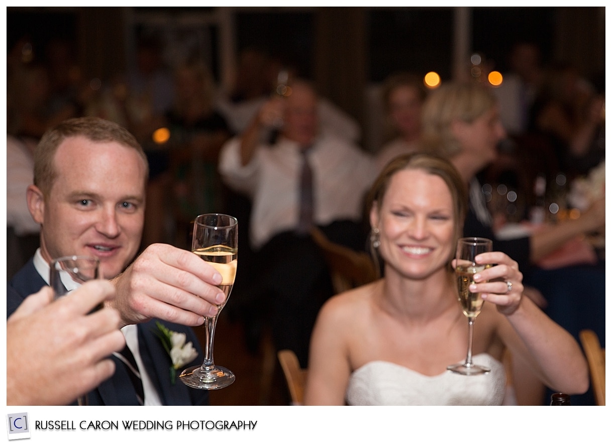 Bride and groom toasting