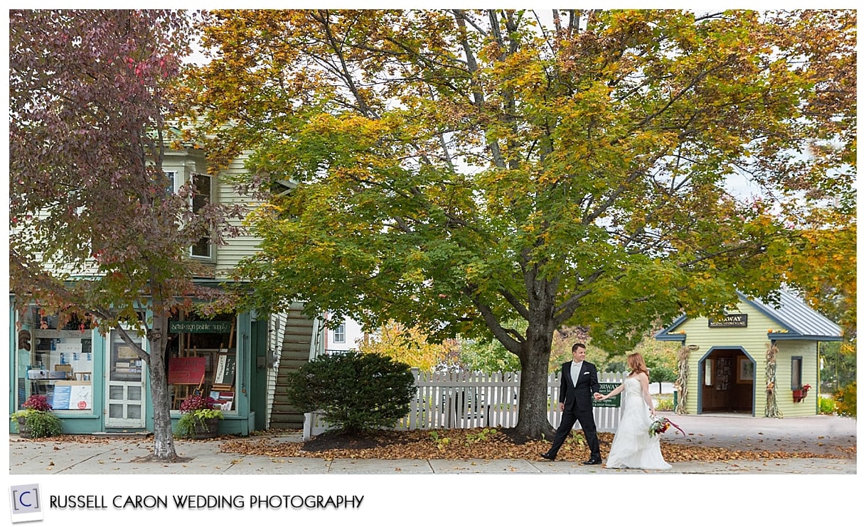 Mallory and Jared walking down Main St, Norway, Maine