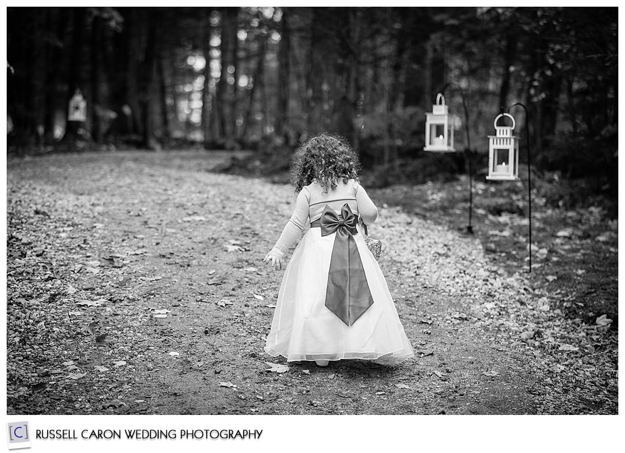 Flower girl leaving wedding ceremony