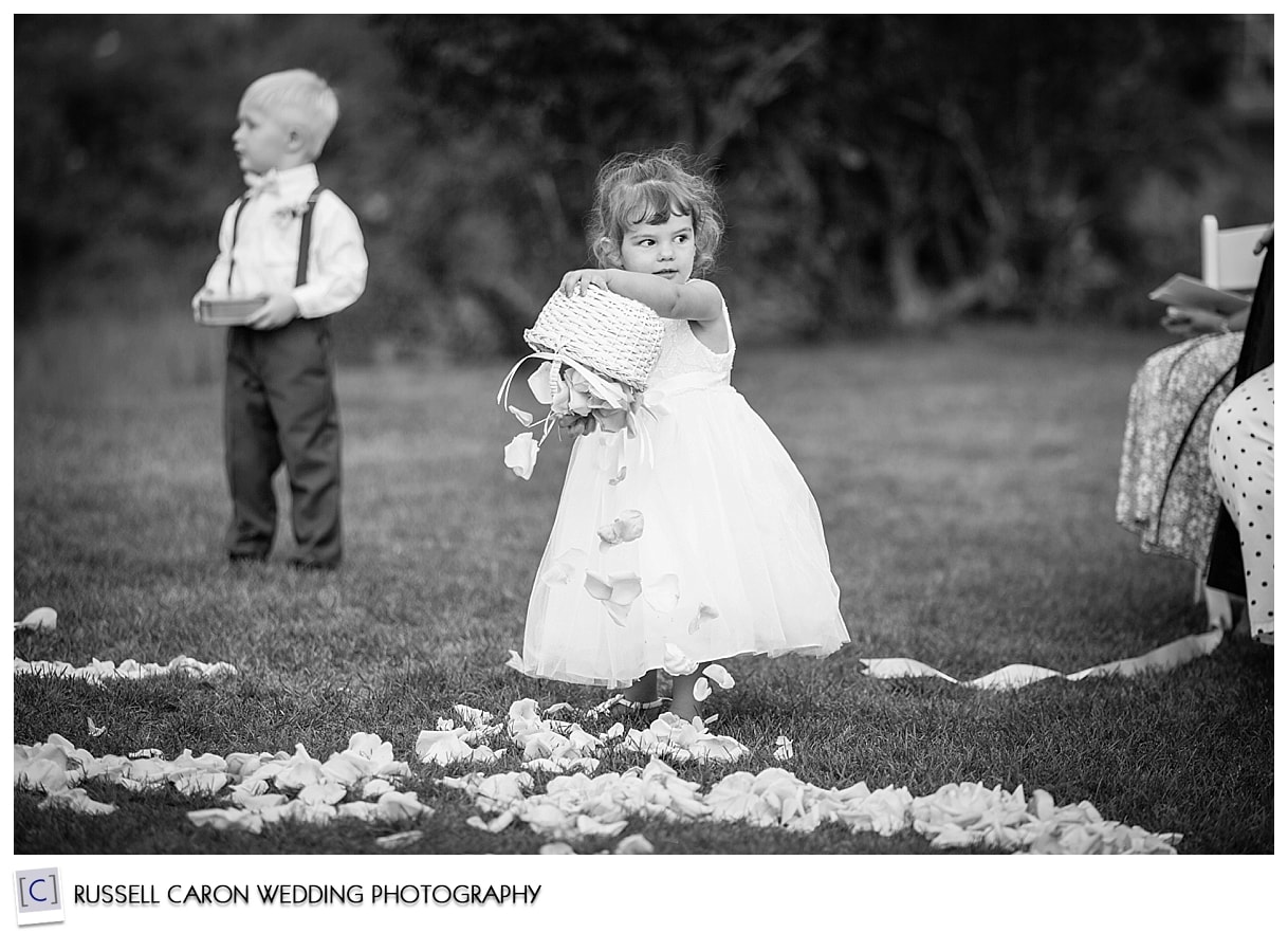 #50 in the amazing wedding photos countdown,flower girl dumping basket