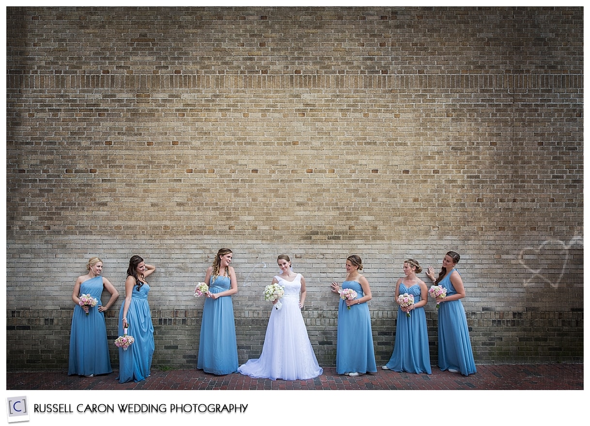 Bride and bridesmaids in front of wall, #46, 50 best wedding images of 2015