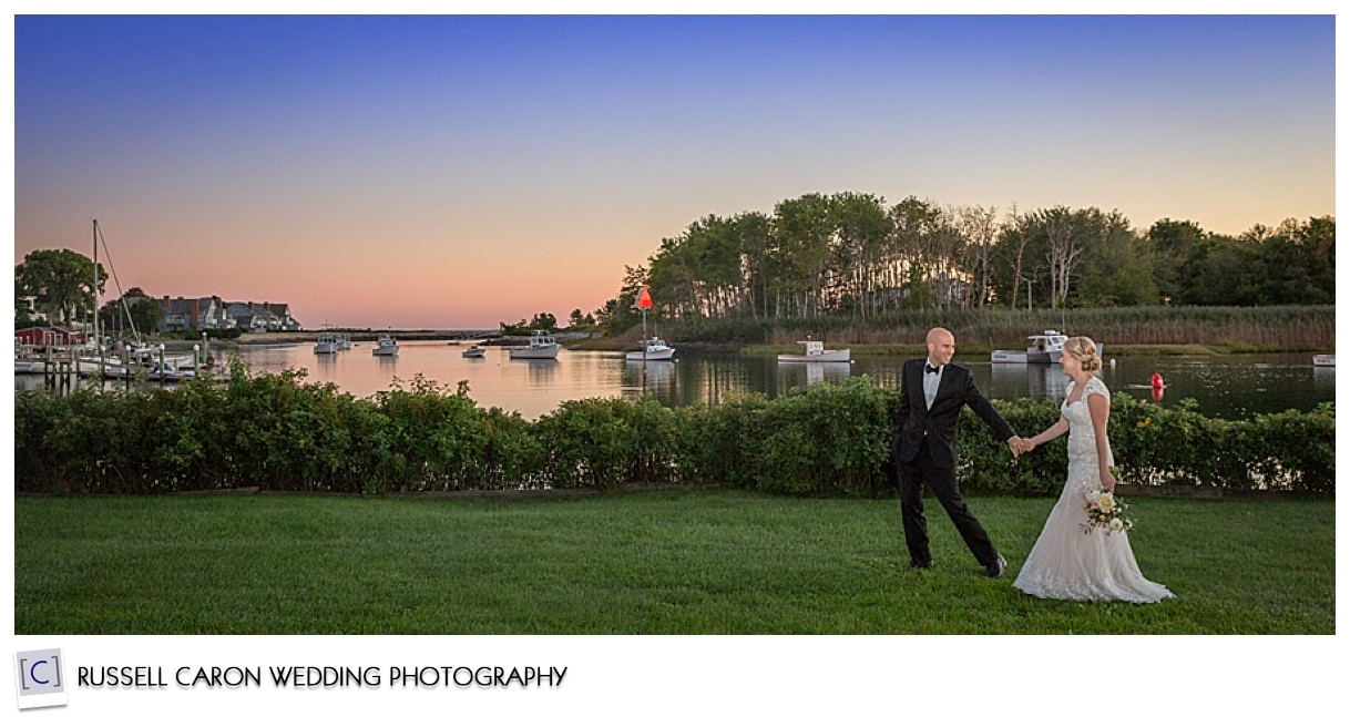 Beautiful bride and groom walking in Kennebunkport, Maine