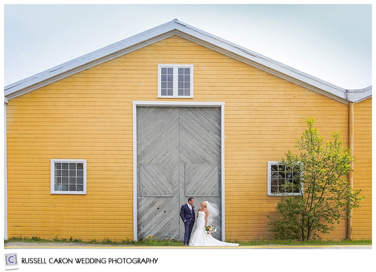 Beautiful bride and groom in front of barn, Boothbay Harbor, Maine weddings