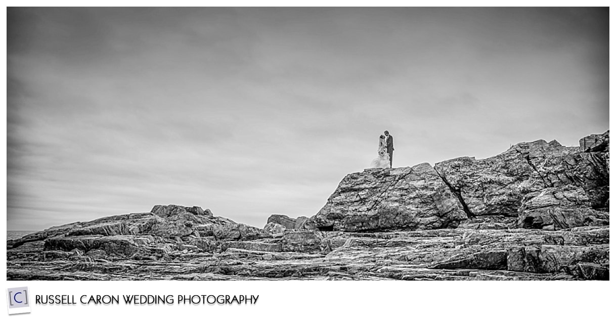 Bride and groom on cliffs in Ogunquit Maine