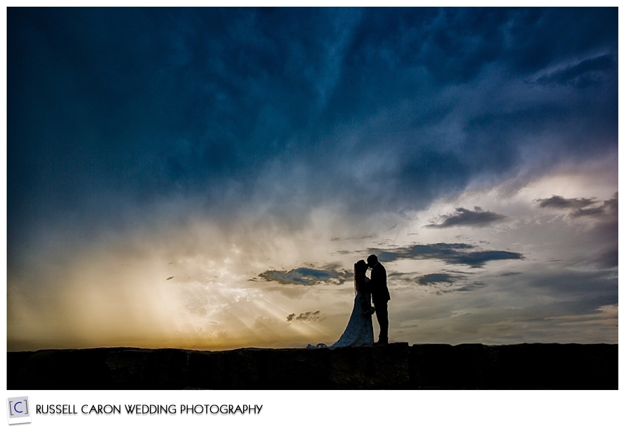 Bride and groom embrace on Kennebunkport breakwater, #3, 50 best wedding images of 2015