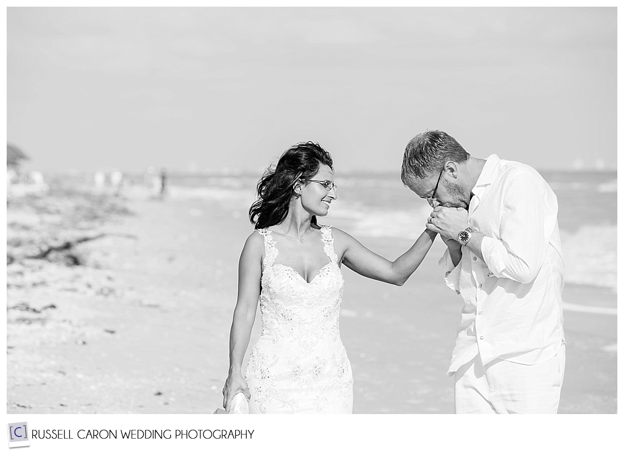 Groom kissing brides hand, Sanibel Island destination wedding photography