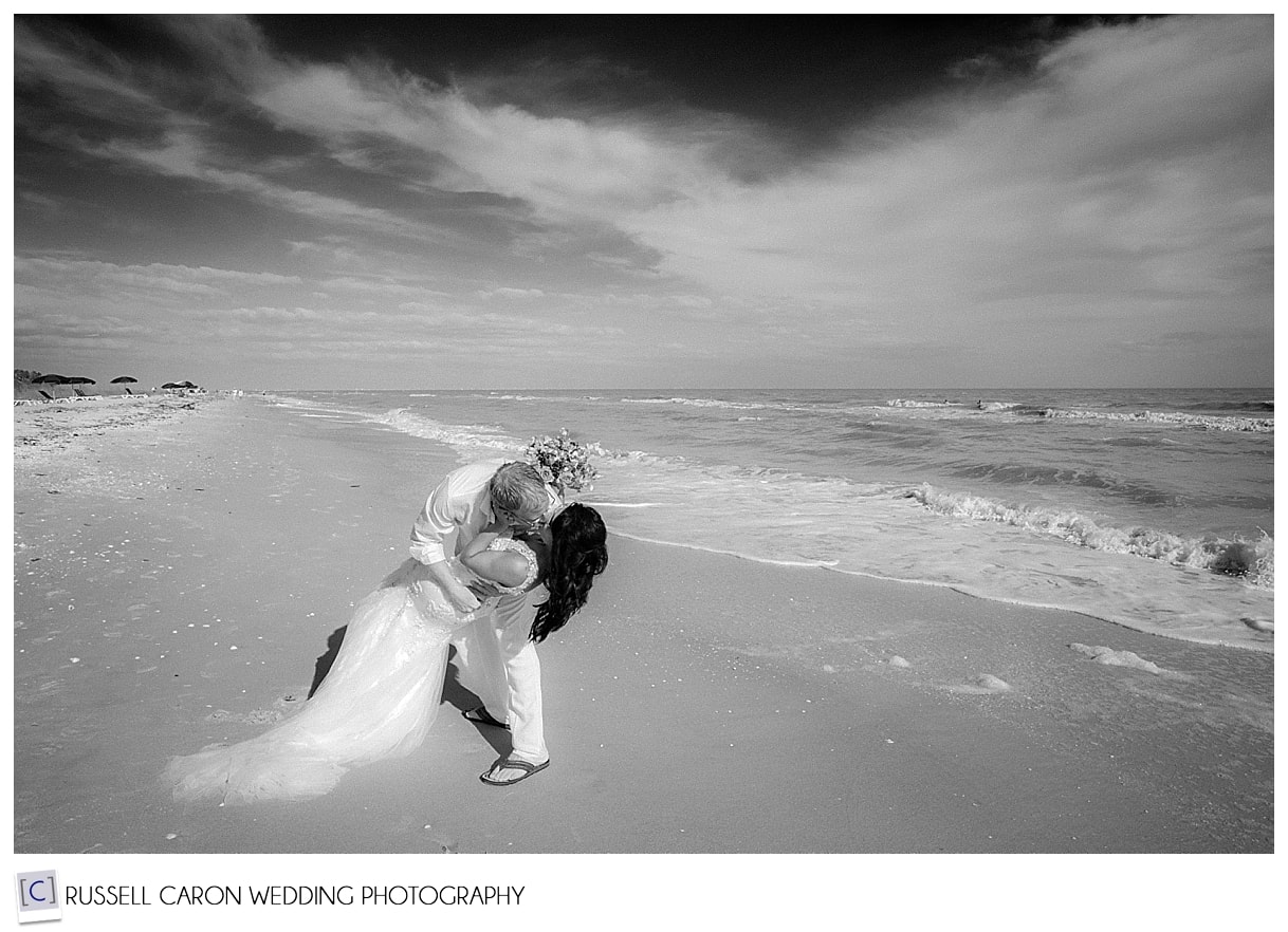 Couple embracing on the beach, Sanibel Island, Florida