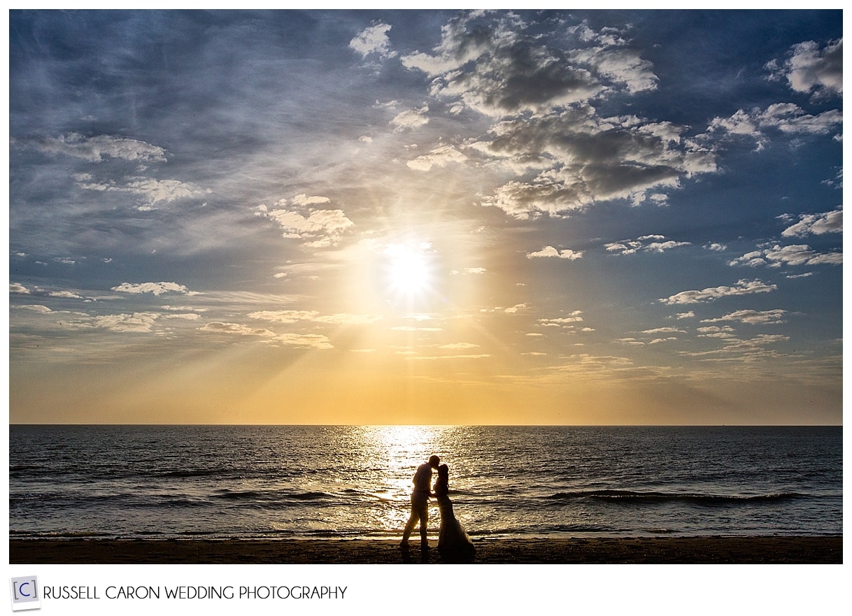 Bride and groom at sunset on Sanibel Island beach