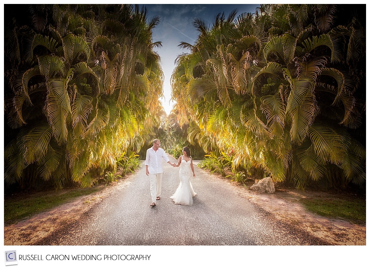 Bride and groom walking down dirt road, Sanibel Island Florida