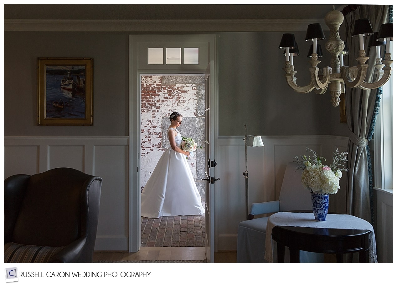 A bride stops in the vestibule at the Inn at Cuckolds Lighthouse Maine