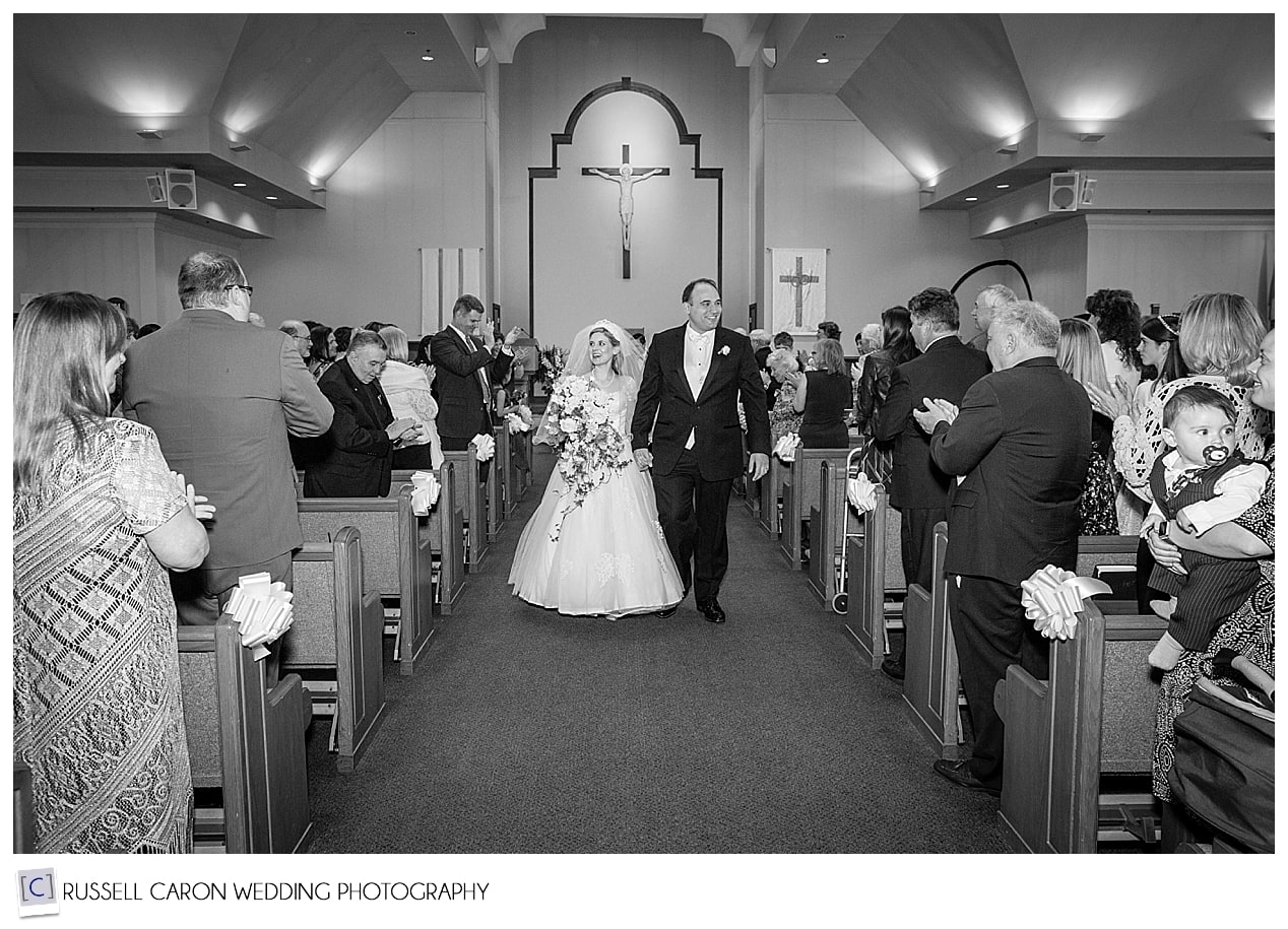 Bride and groom during wedding recessional