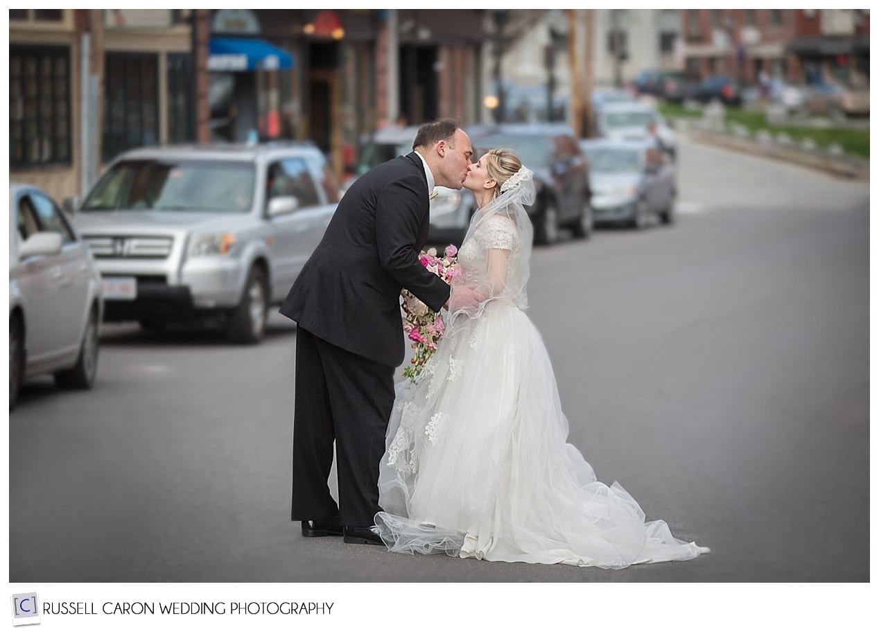Bride and groom in the middle of Fore Street, Portland Maine