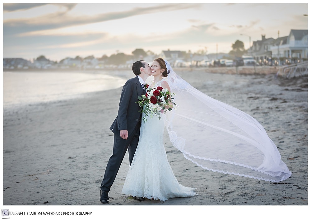 stunning beach moment with a bride and groom on Gooch's Beach in Kennebunk, Maine