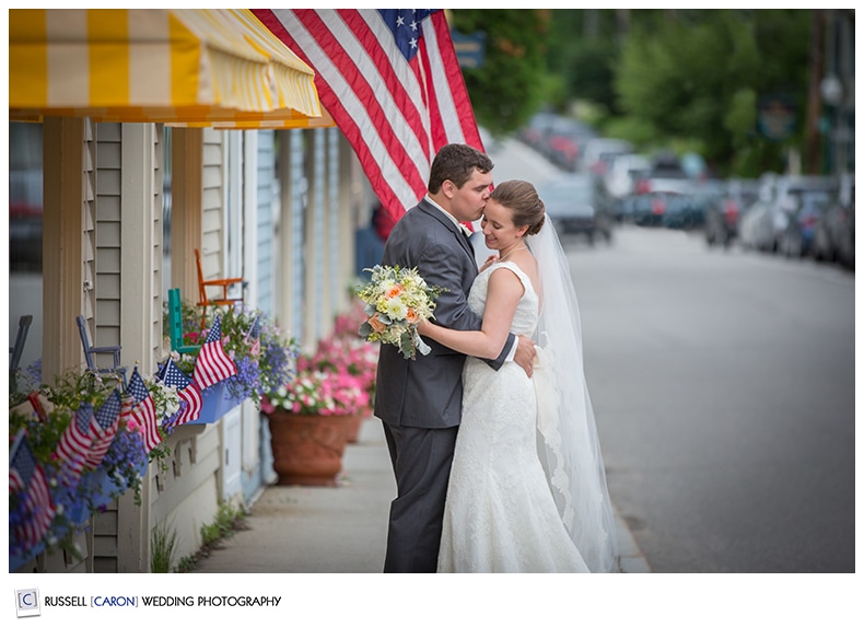 Bride and groom in downtown Camden Maine,