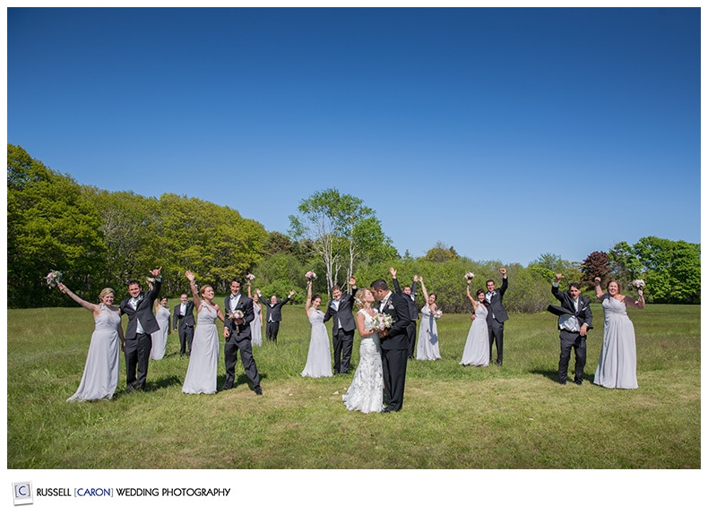 Bridal party photo in a field