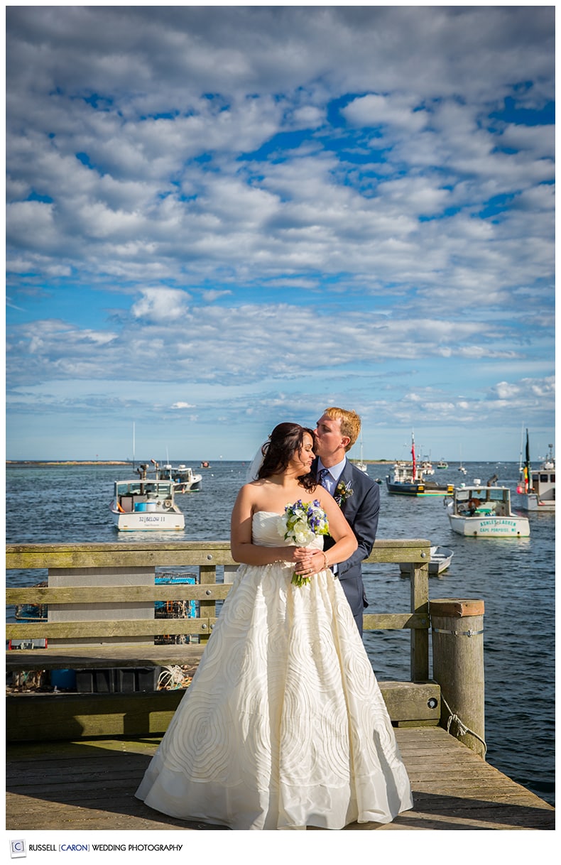 Bride and groom on the dock in Cape Porpoise