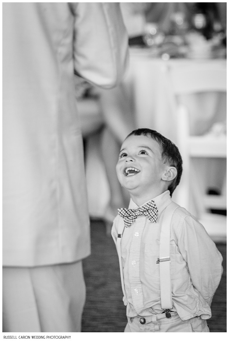 Ring bearer joins father of the bride for a toast