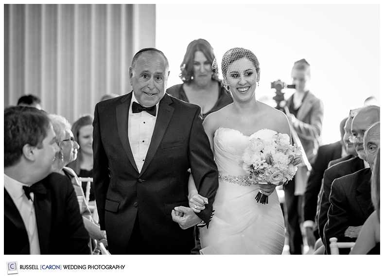 Bride and father during processional at indoor Nonantum Resort wedding