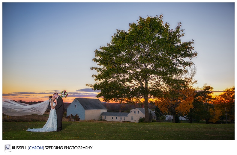 Bride and groom and a beautiful sunset at Laudholm Farm, Kennebunkport