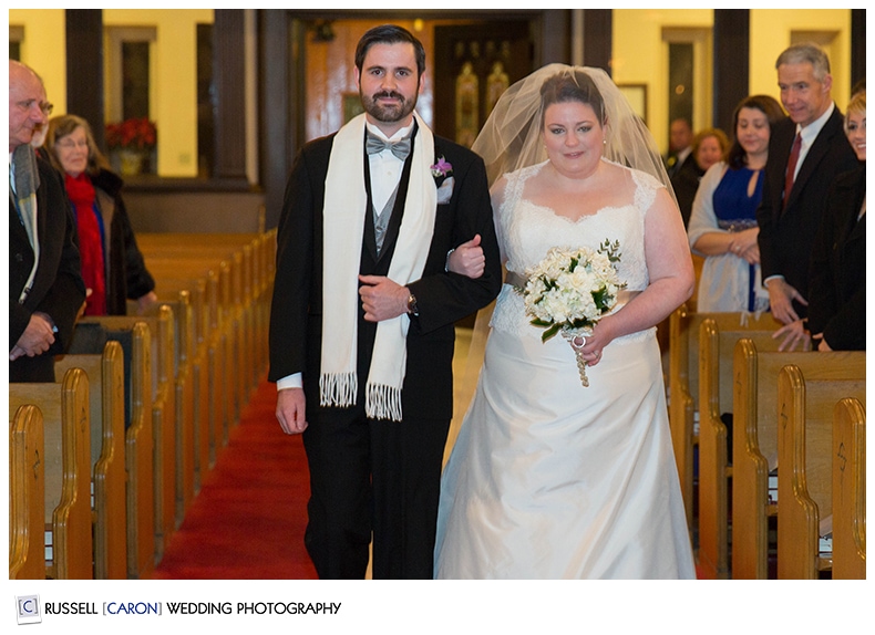 Bride and brother during processional at st columbkille parish weddings