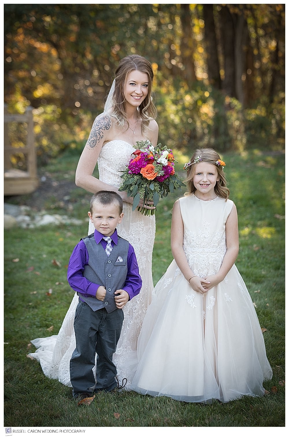 bride with the flower girl and ring bearer