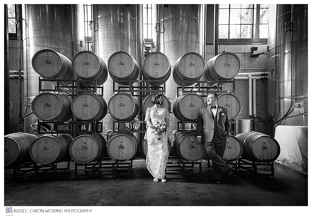 A stellar wedding image of Amy and Jim surrounded by the wine casks at LaBelle Winery, Amherst, NH