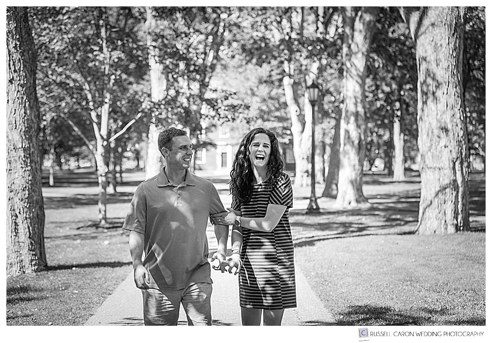 man and woman walking and laughing. 2017 Favorite Maine engagement images 