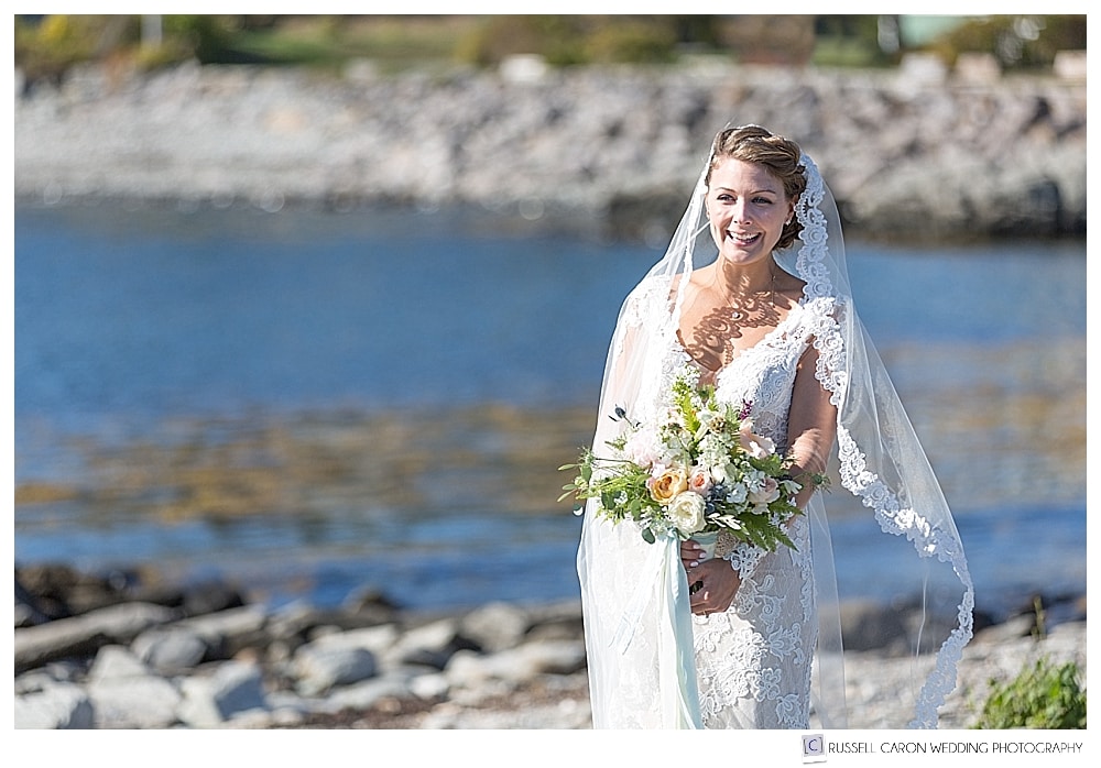 Bride smiling during Peaks Island Maine wedding day first look
