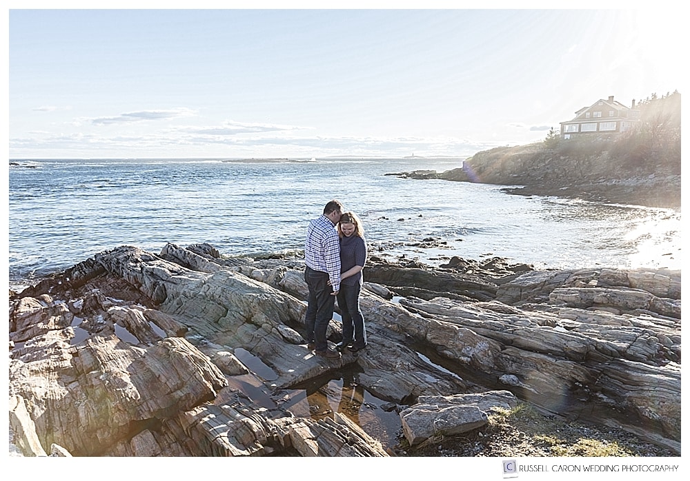 A couple on the rocks at Land's End during a Bailey Island engagement session